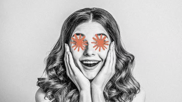 Black and white portrait with orange starbursts over the eyes, representing public reaction to AI